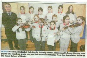 Holy Family musicians in the paper